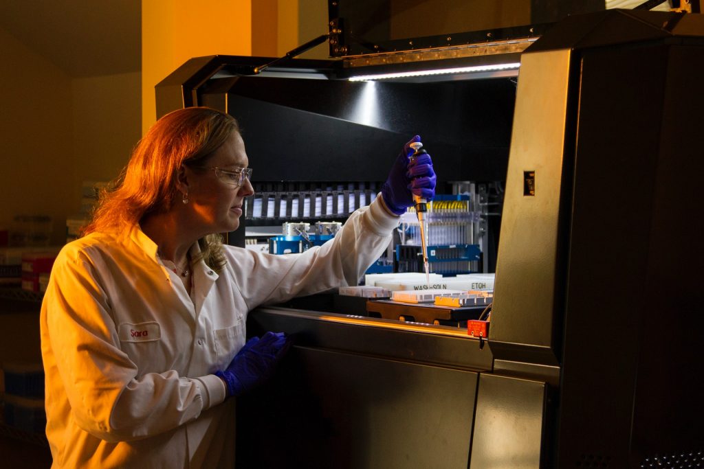 Chemist conducting research for biotechnology companies