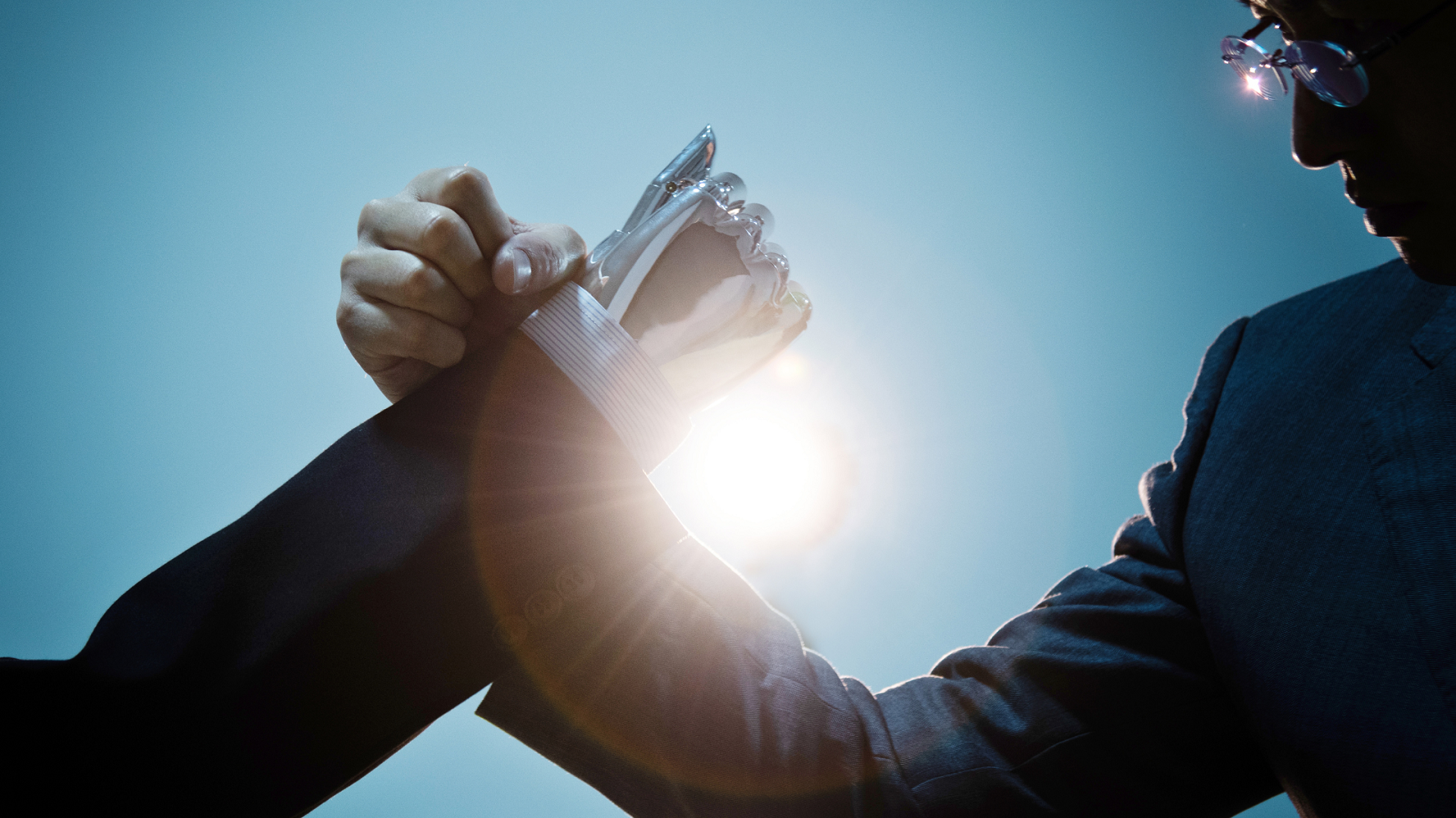 Human transcriptions and AI transcriptions clashing hands