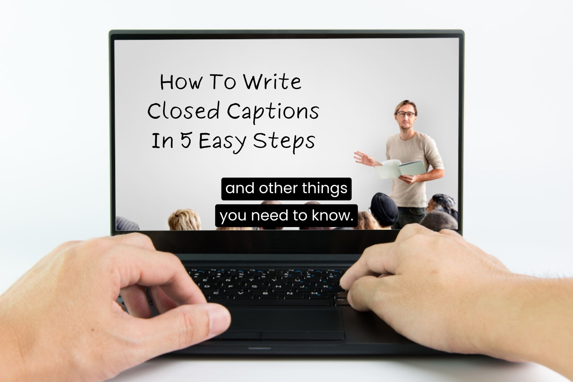 Laptop with video showing how to write closed captions